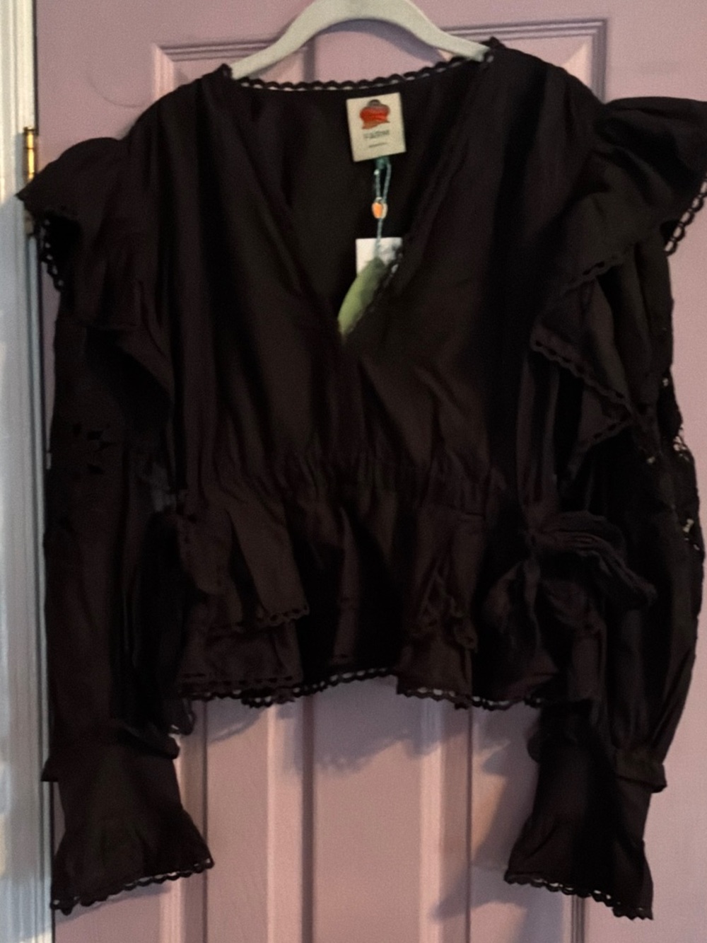 Farm Rio gorgeous black blouse with lace details on sleeves.